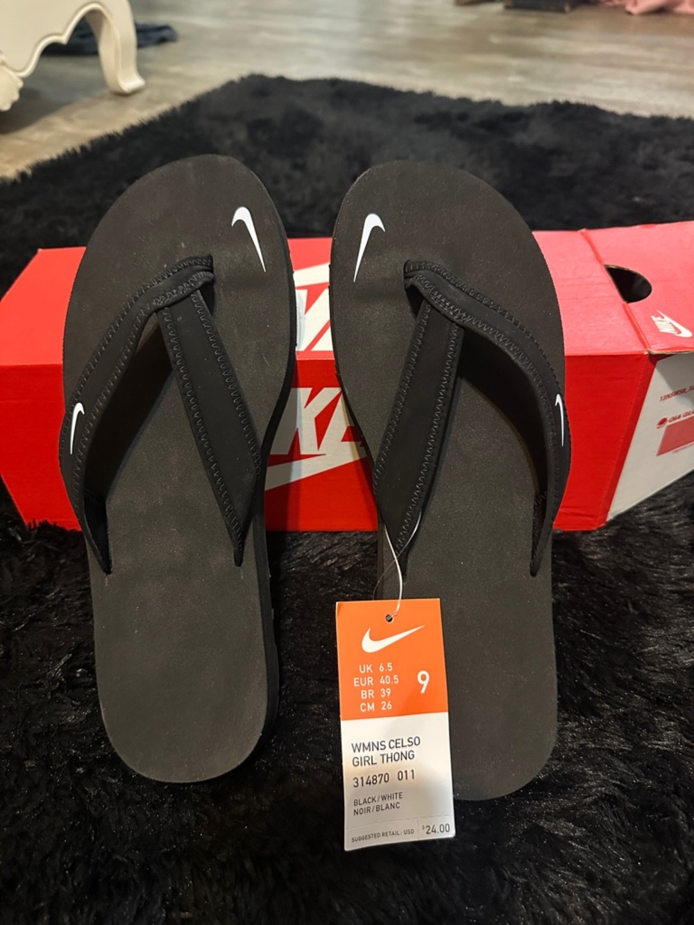 Nike Black Women's Celso Thong Sandals with White Swoosh